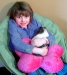Girl with Pink Flower Pillow and Guinea Pig